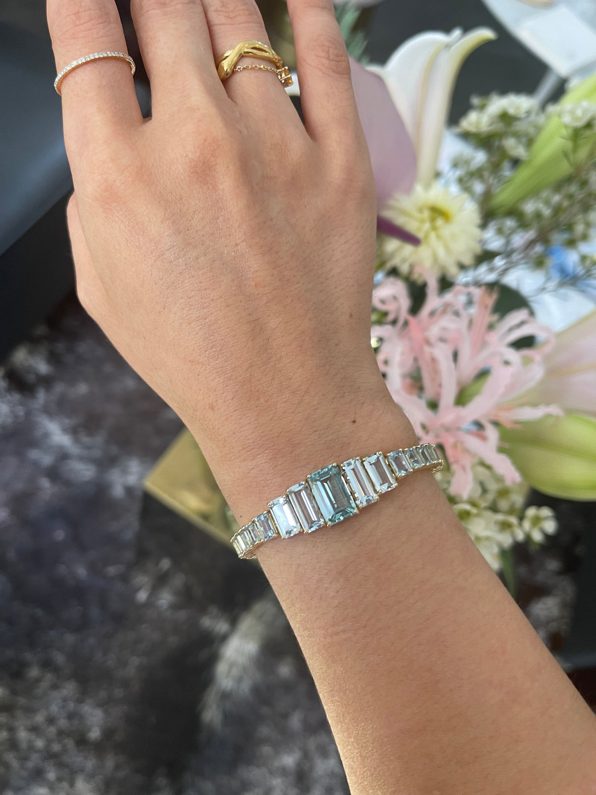 Aquamarine Echo Bar Bracelet 18k gold stackable design on model
