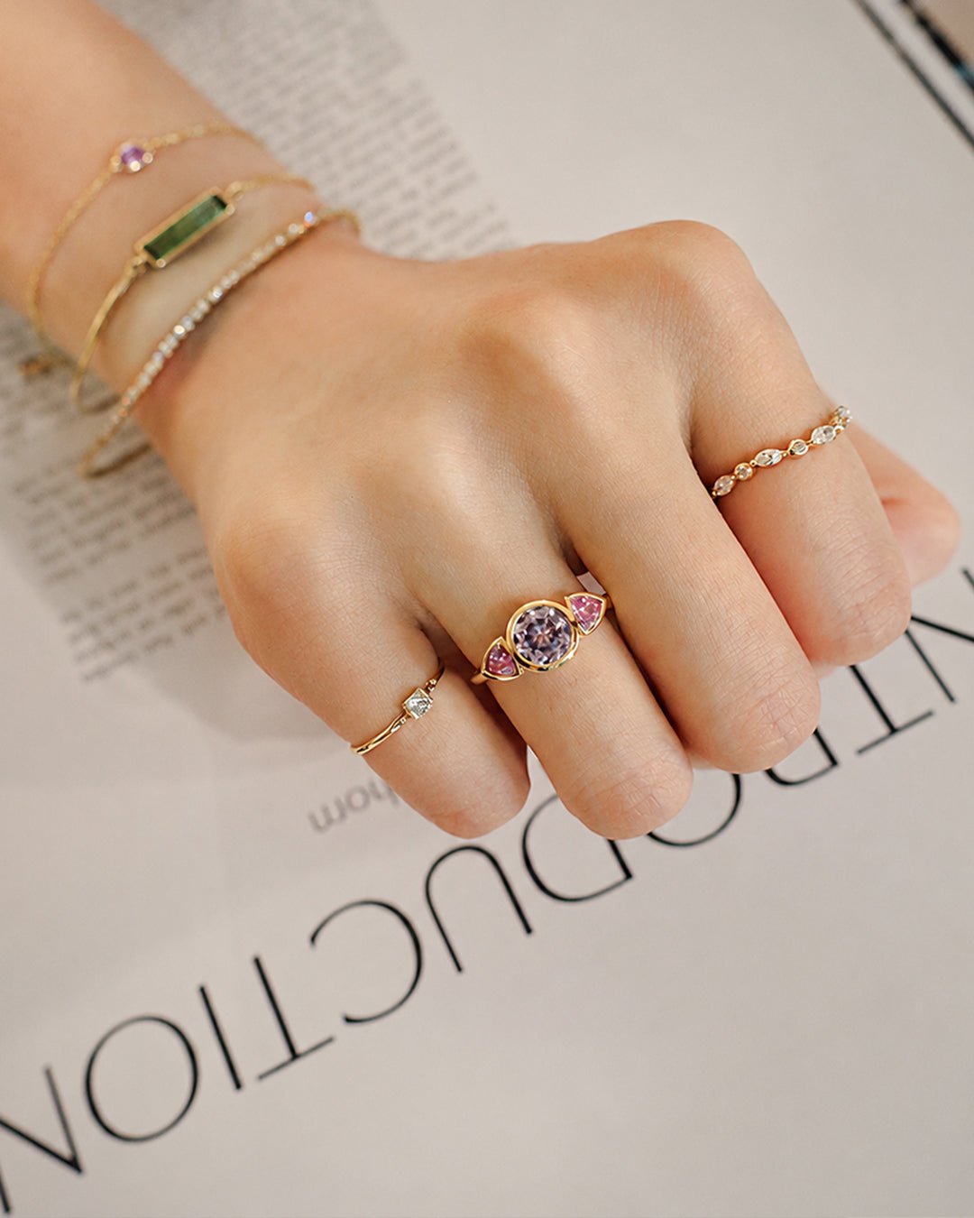 Baby_Blue_Pink_Sapphire_Ring_18K_gold_engagement_ring_on_model_2