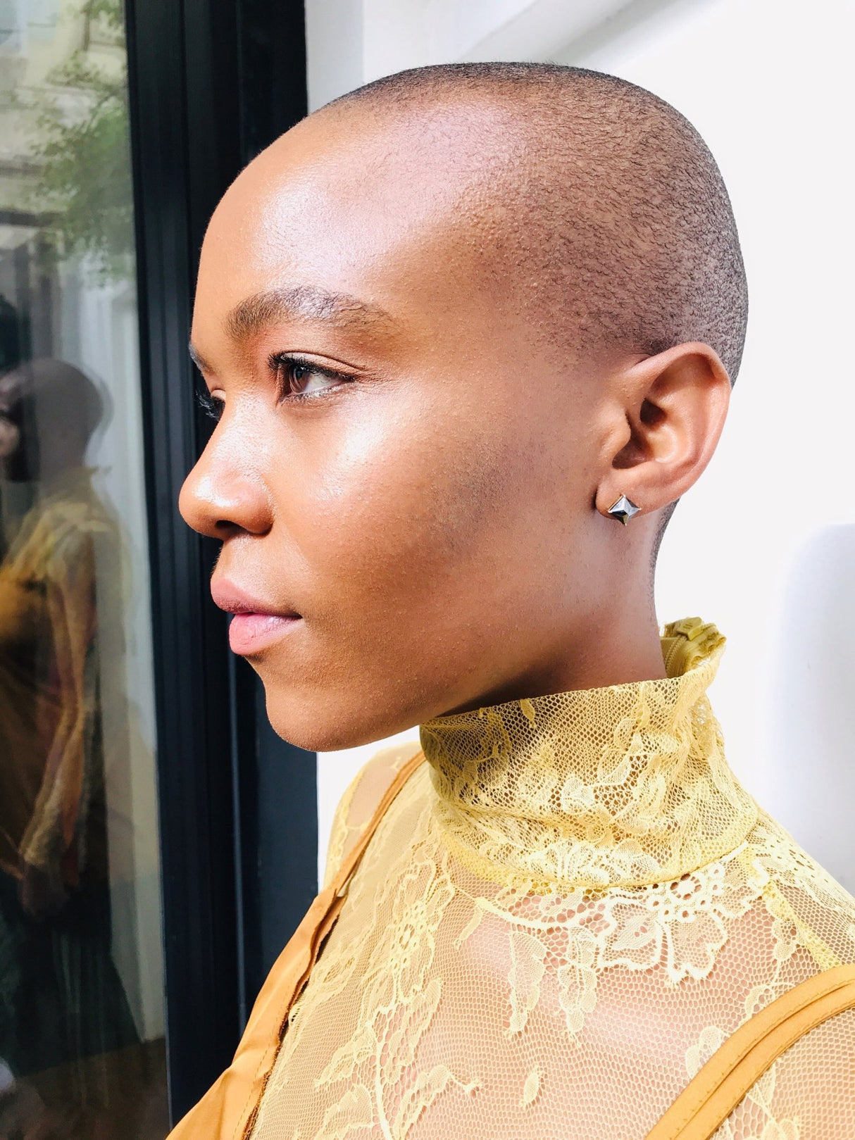 black Diamond stud earring on model