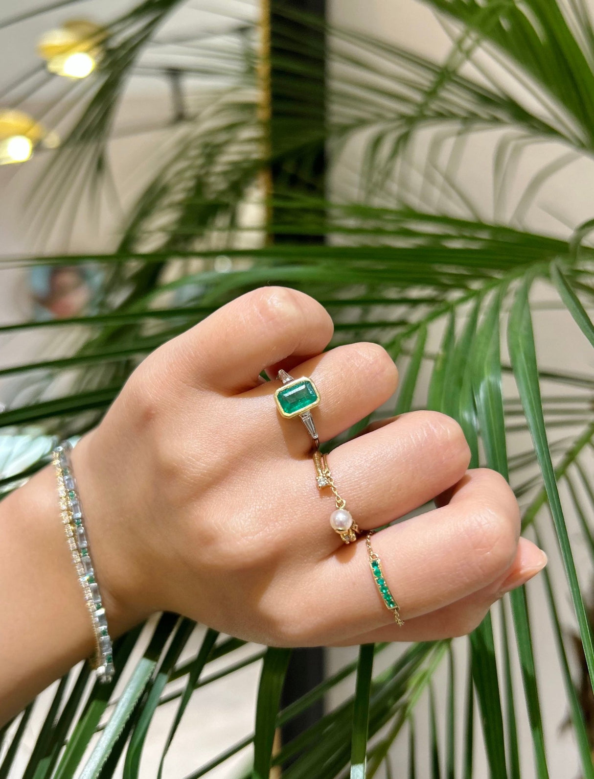 Brazilian Emerald & Diamond Eternal Ring 18k gold engagement ring on model