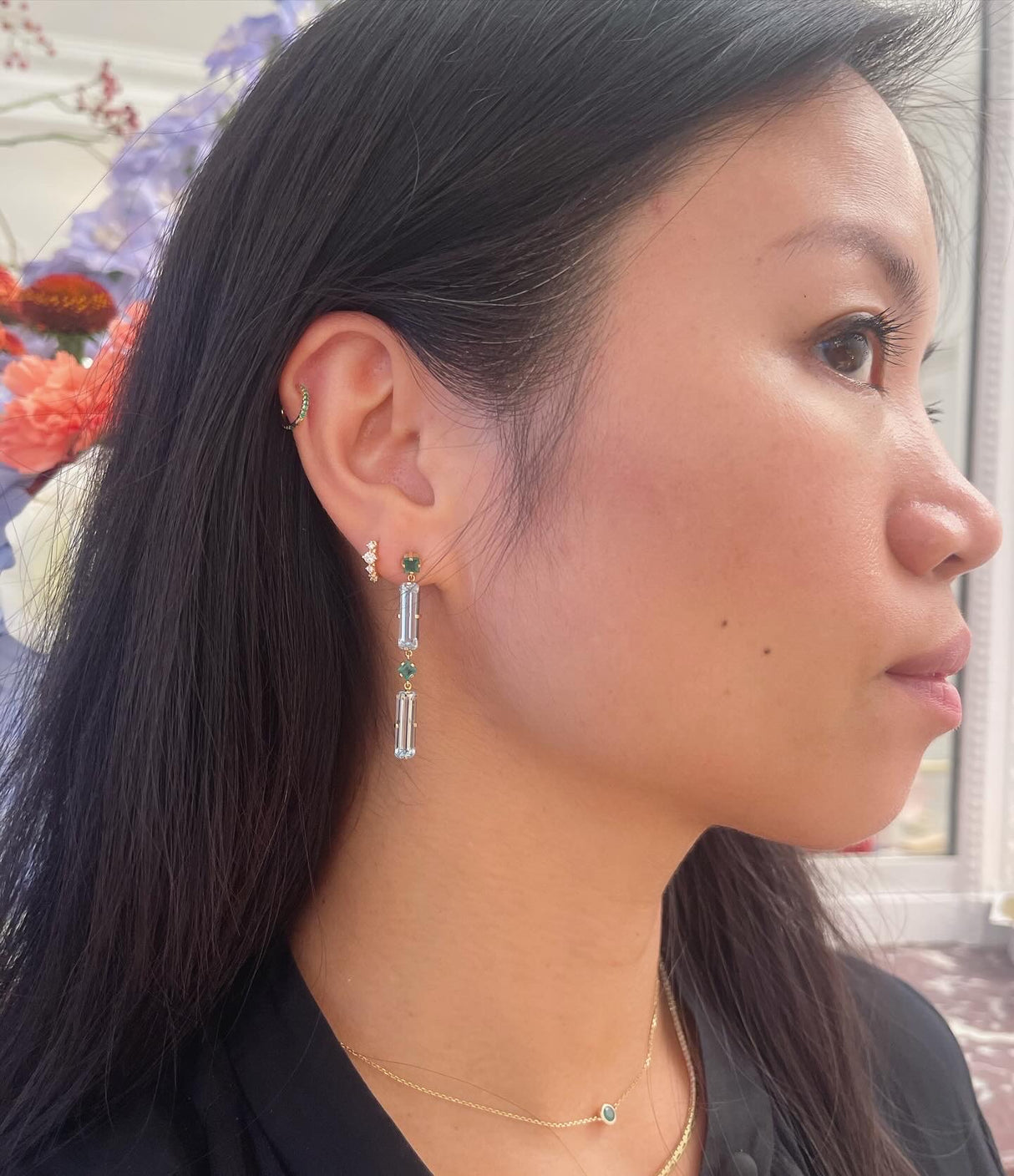Emerald & Blue Topaz Cascade Bar Earrings on model