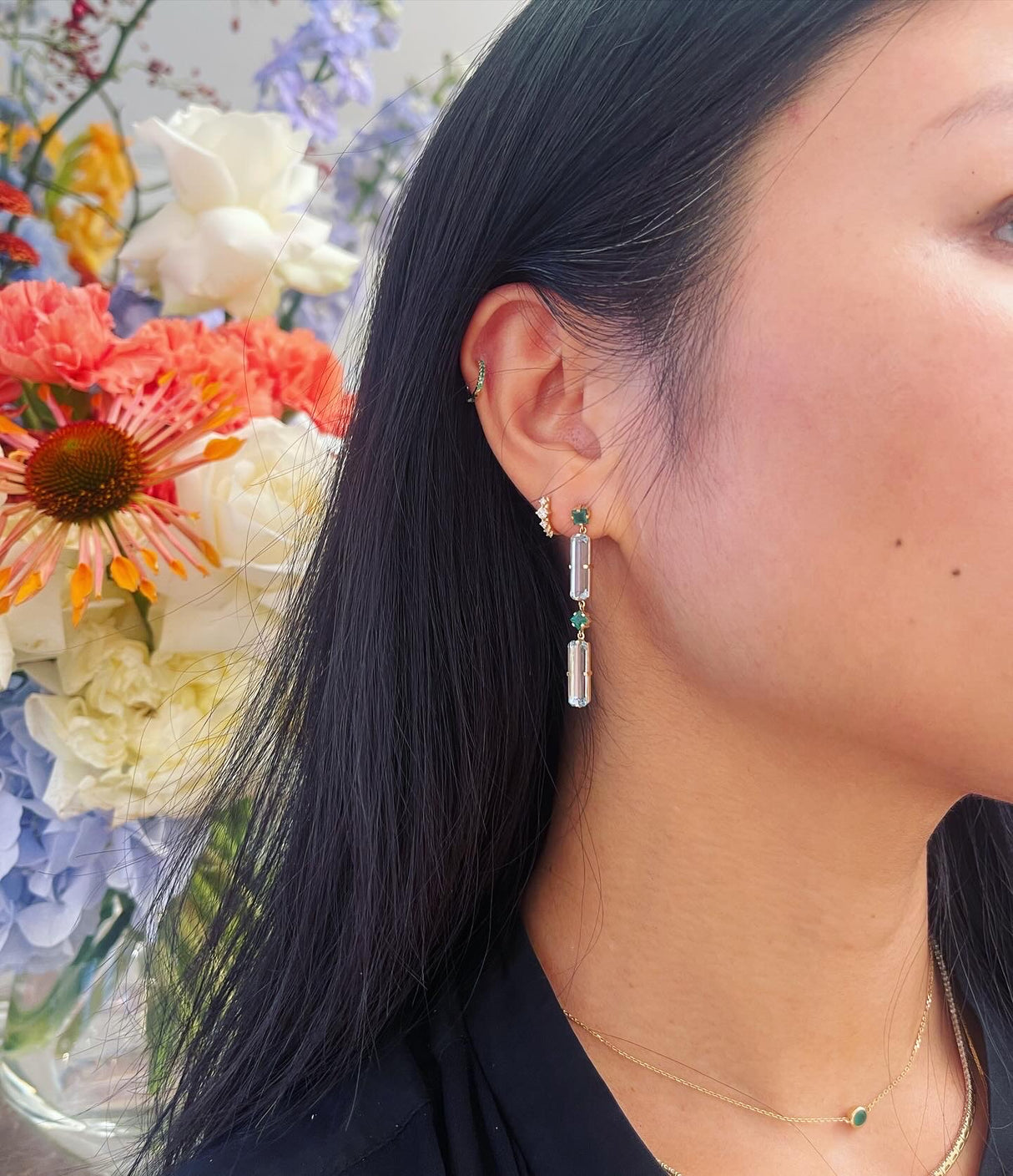 Emerald & Blue Topaz Cascade Bar Earrings on model