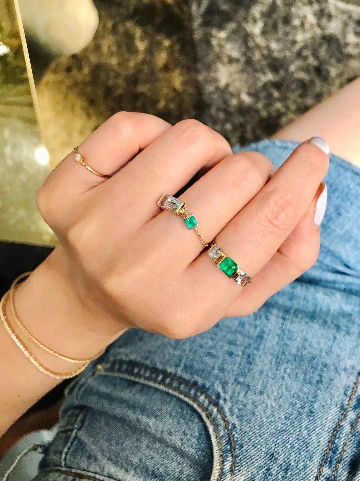 Emerald & Aquamarine Triplet Spring Ring 18k gold stackable ring on model 2