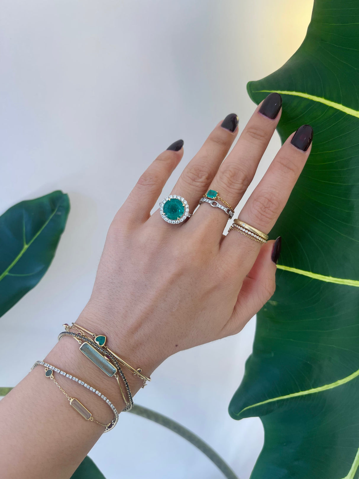 Emerald & Diamond Isis Ring 18k gold engagement ring on model