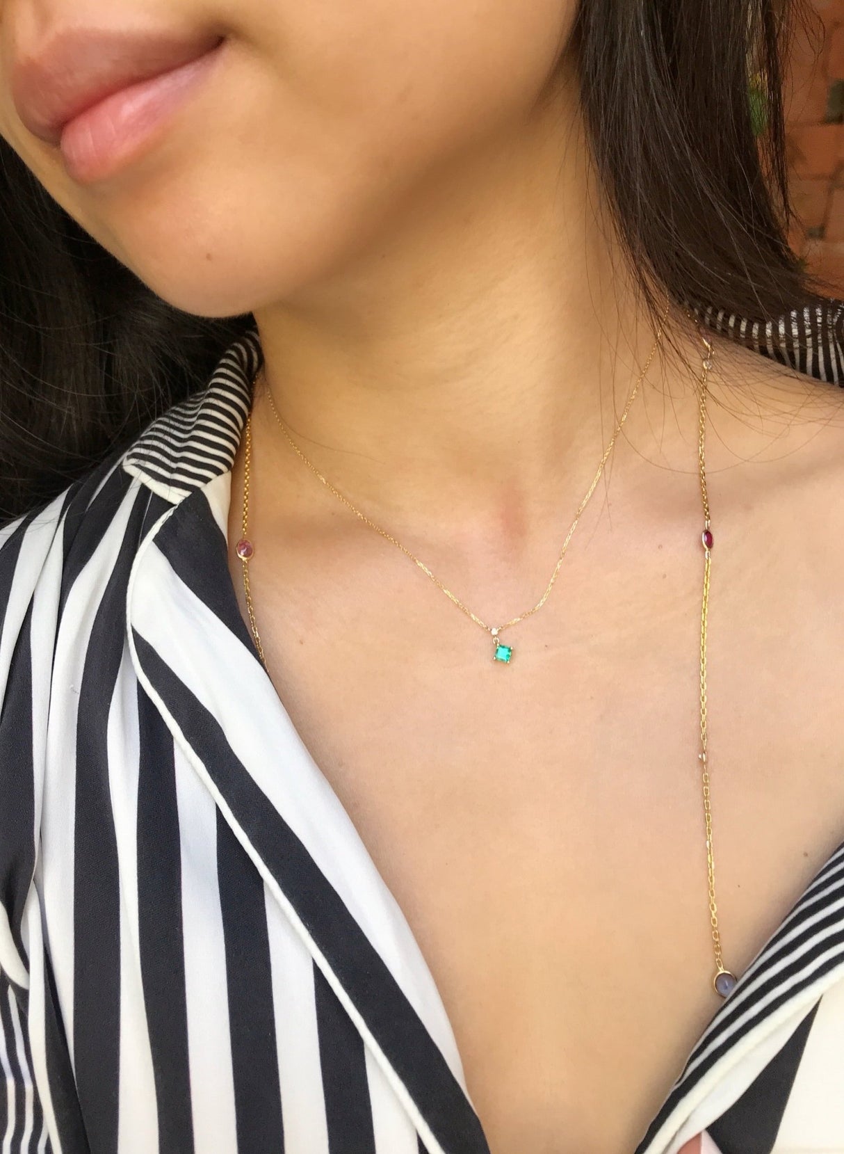 Emerald & Diamond Whispers handmade Necklace in 18k gold on model