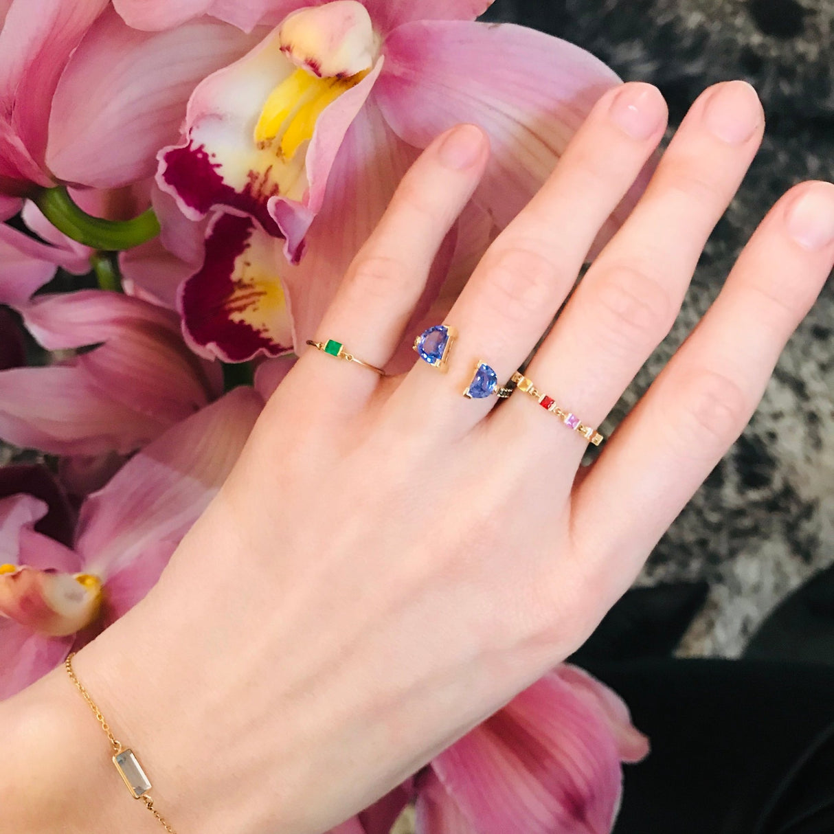 Emerald Petite Circle Ring 14k gold stackable ring on model