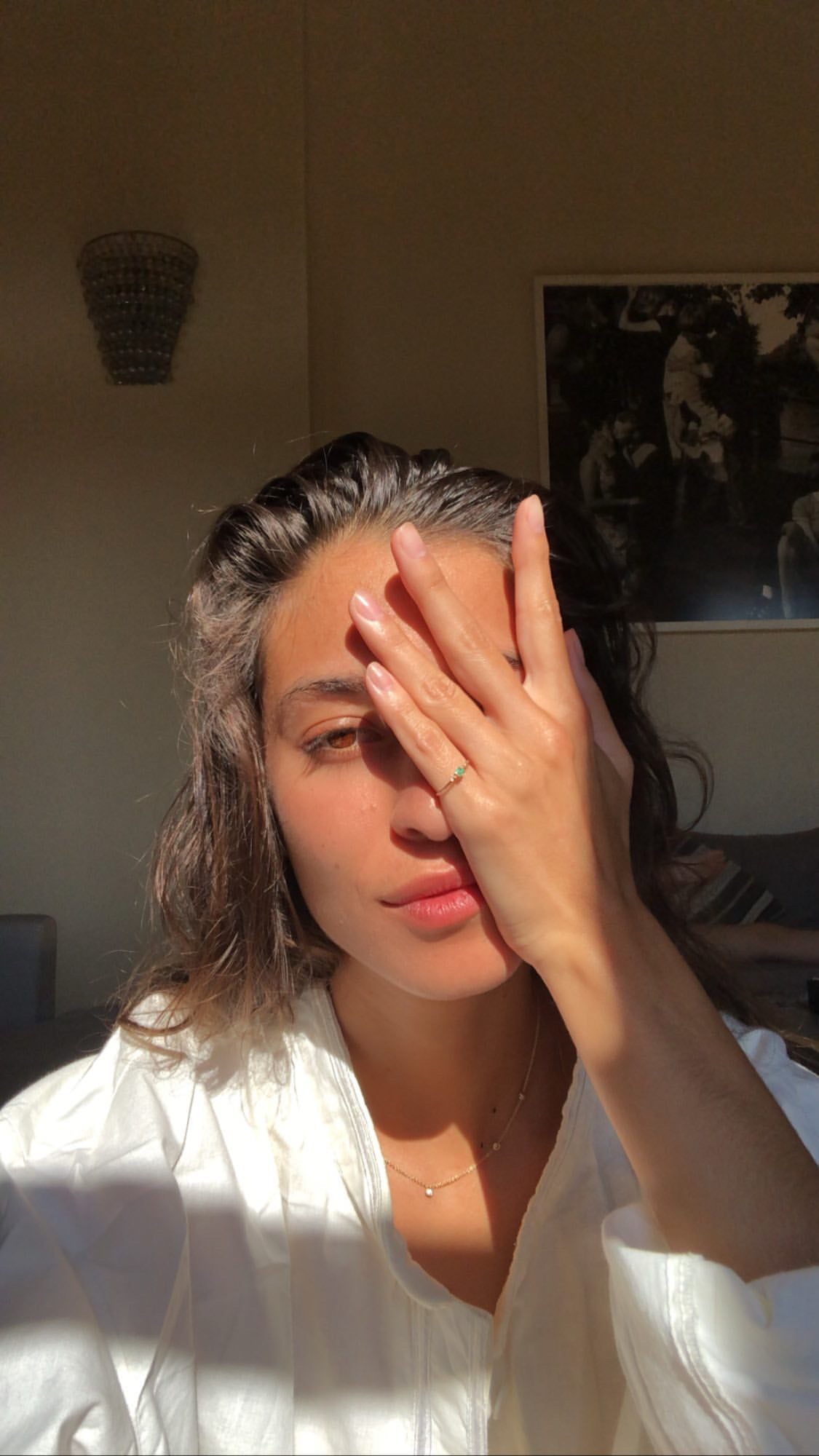 Emerald Petite Circle Ring 14k gold stackable ring on model 2