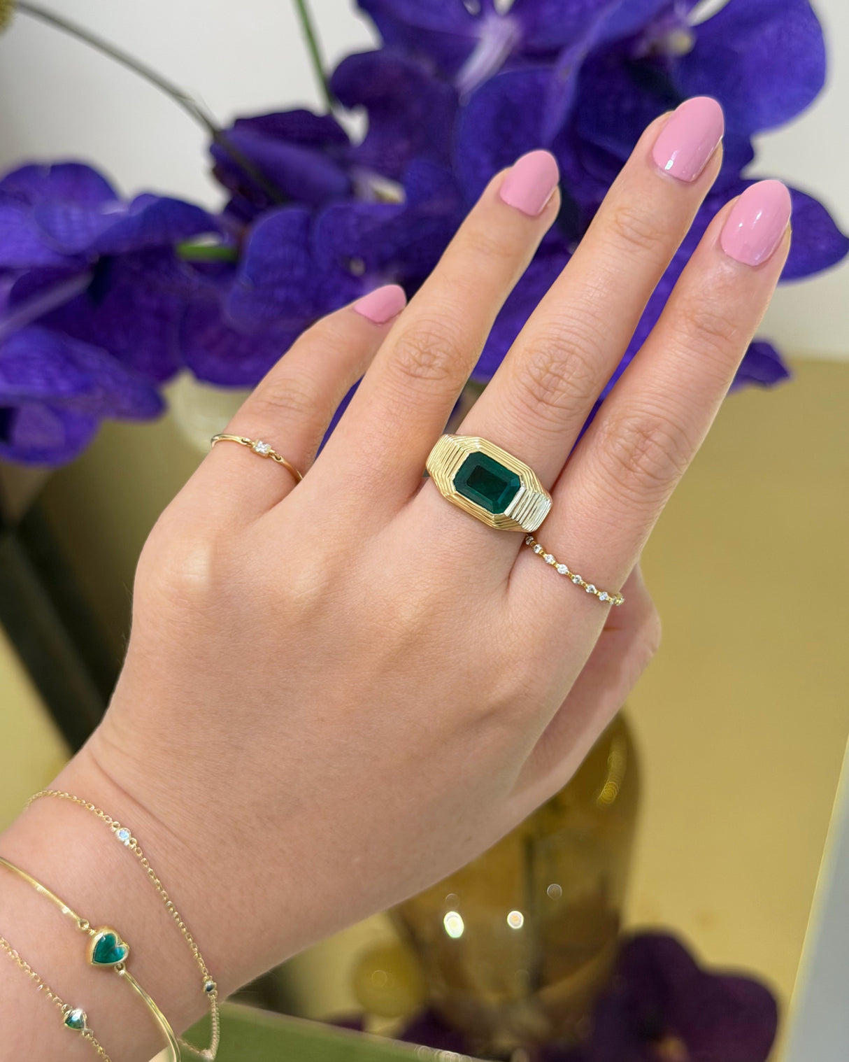 Emerald_Pyramid_Ring_18K_gold_engagement_ring_on_model_1
