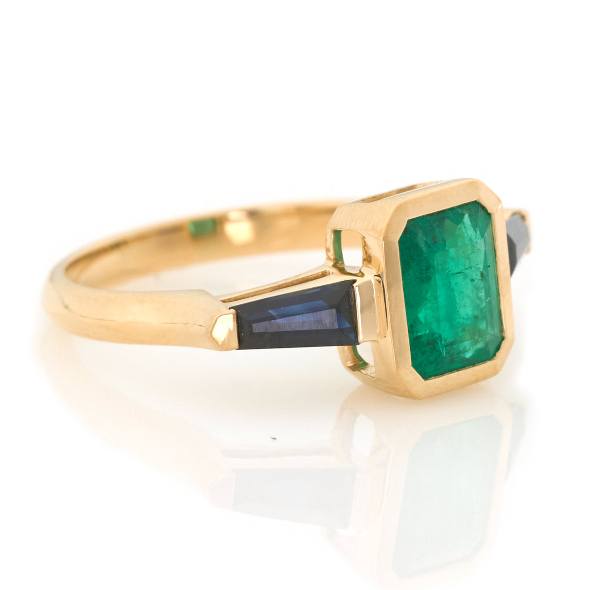Emerald & Royal Blue Sapphire Eternal Ring 18k gold engagement ring side view