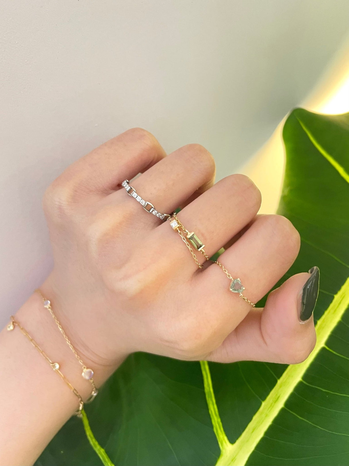 Green Sapphire Heart Chain Ring 14k gold Stackable ring on model 1