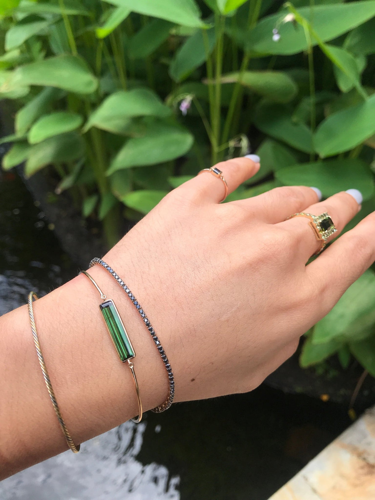 Green Tourmaline Bar Bangle 18k gold stackable design on model 3