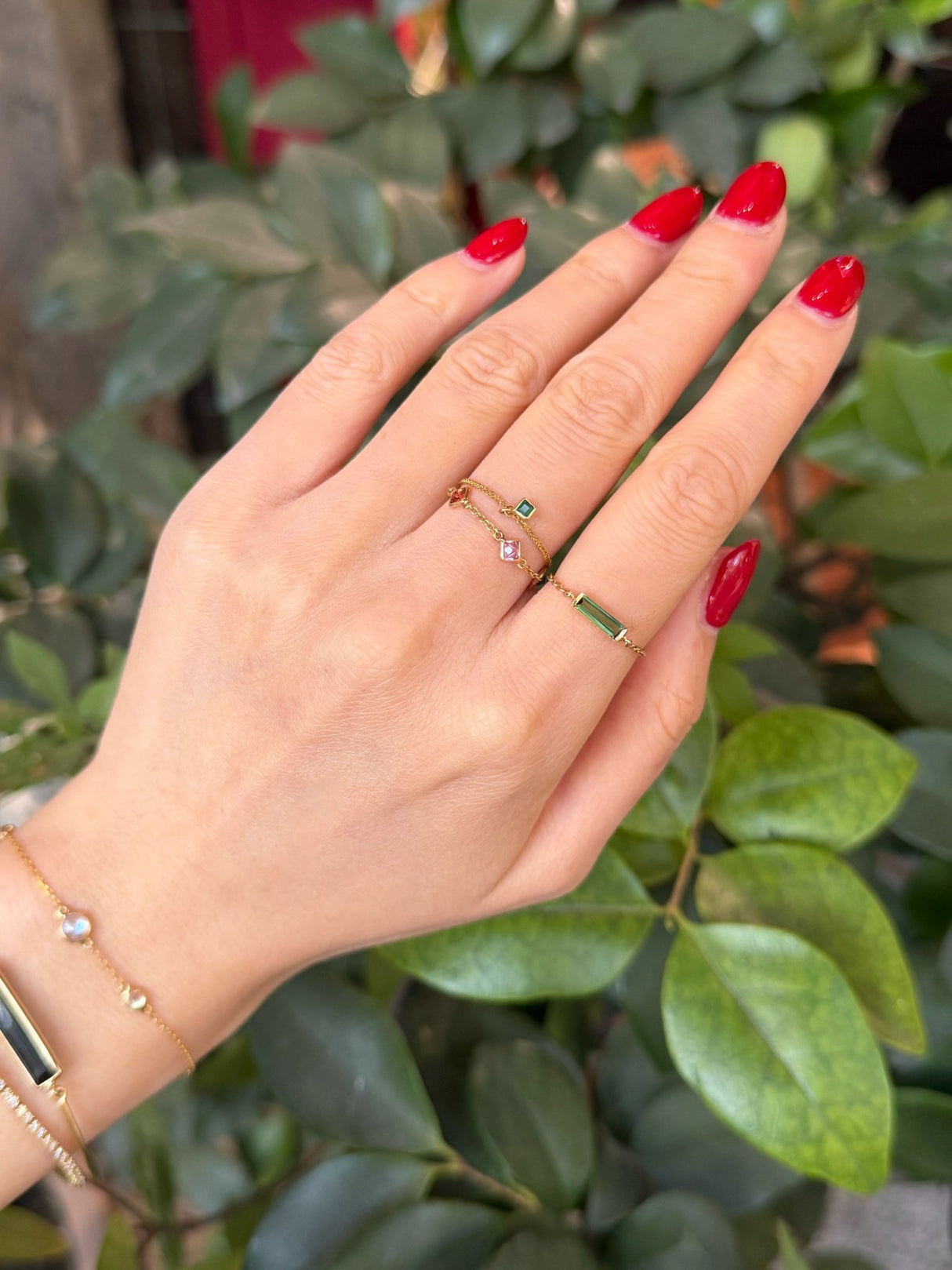 Green Tourmaline Slim Bar chain ring 14K gold stackable design on model