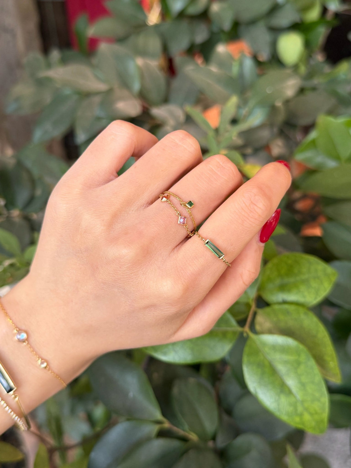 Green Tourmaline Slim Bar chain ring 14K gold stackable design on model 2