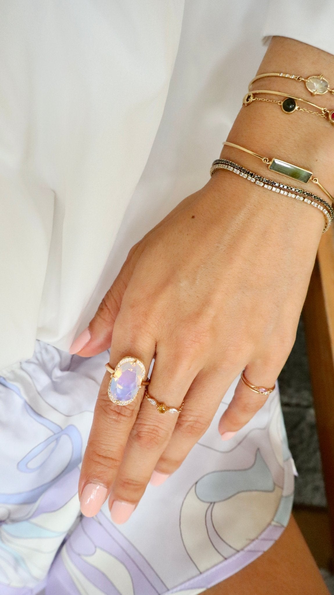 Jelly_Opal_Aurora_Ring_18K_gold_engagement_ring_on_model_1