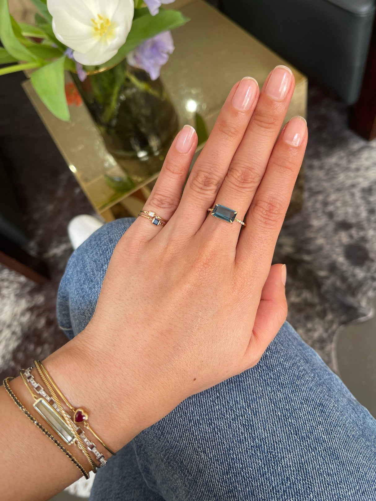 London Blue Topaz Petite Circle Diamond Ring 18k gold engagement ring on model