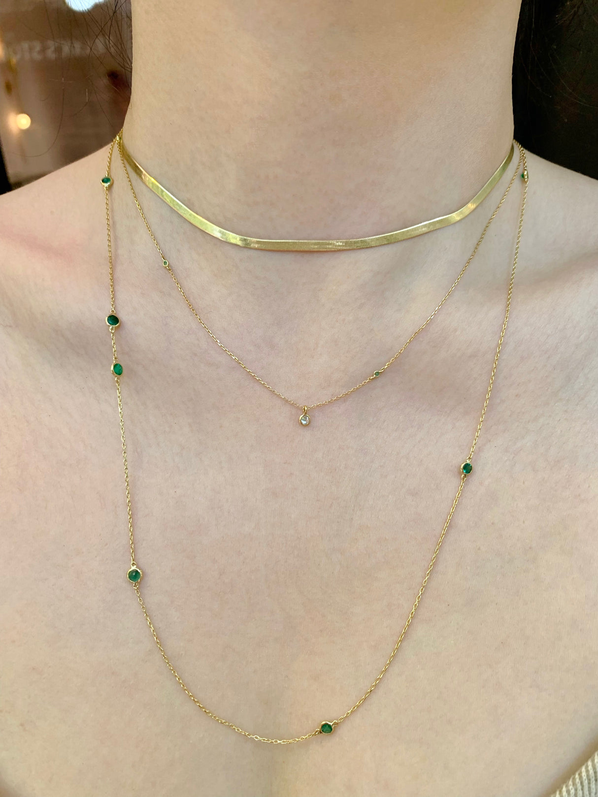 Long Emerald Dot Necklace 18k handmade fine jewelry on model