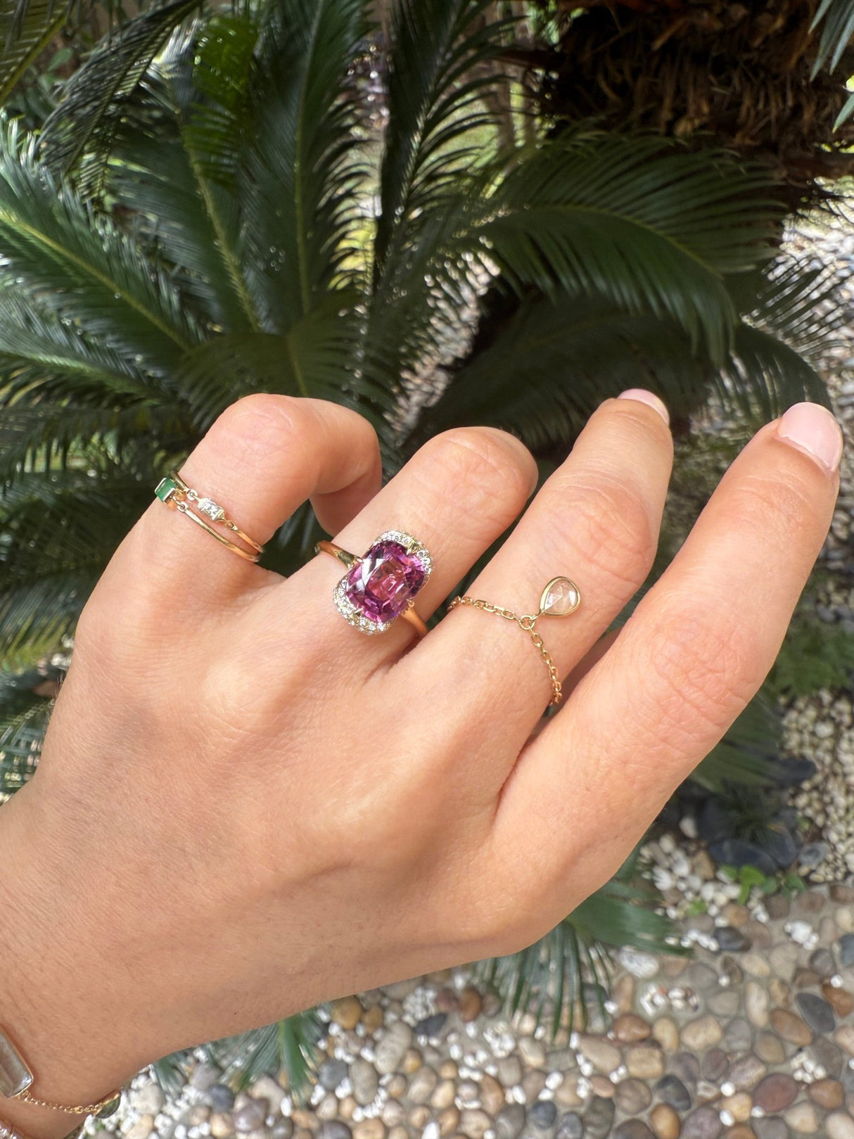 Mahenge Garnet Aurora Ring 18k gold engagement ring on model