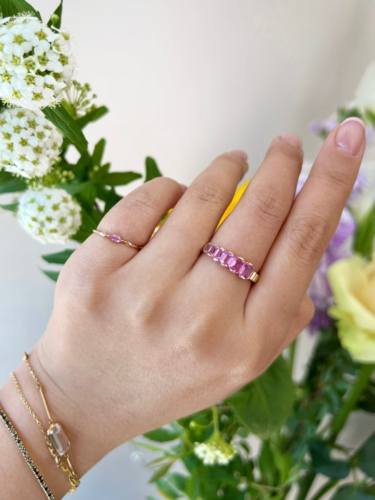 Pink Sapphire Crescendo Ring (Vertical) 18k gold engagement ring on model