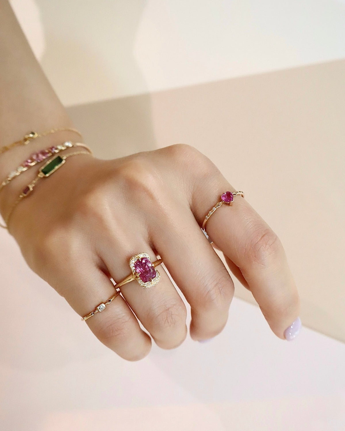 Pink_Spinel_Aurora_Ring_18K_gold_engagement_ring_on_model_3