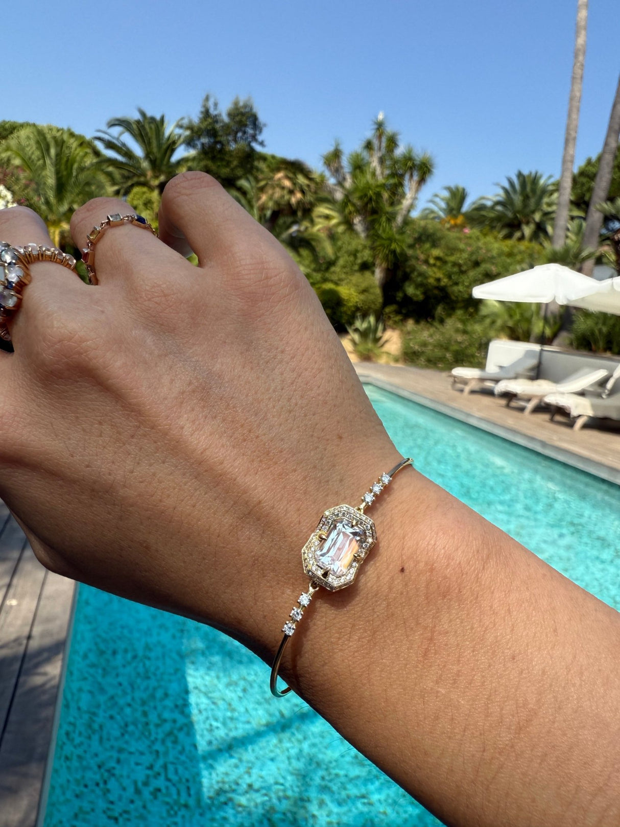 Rainbow Moonstone Aurora Bangle 18k gold Stackable design on model