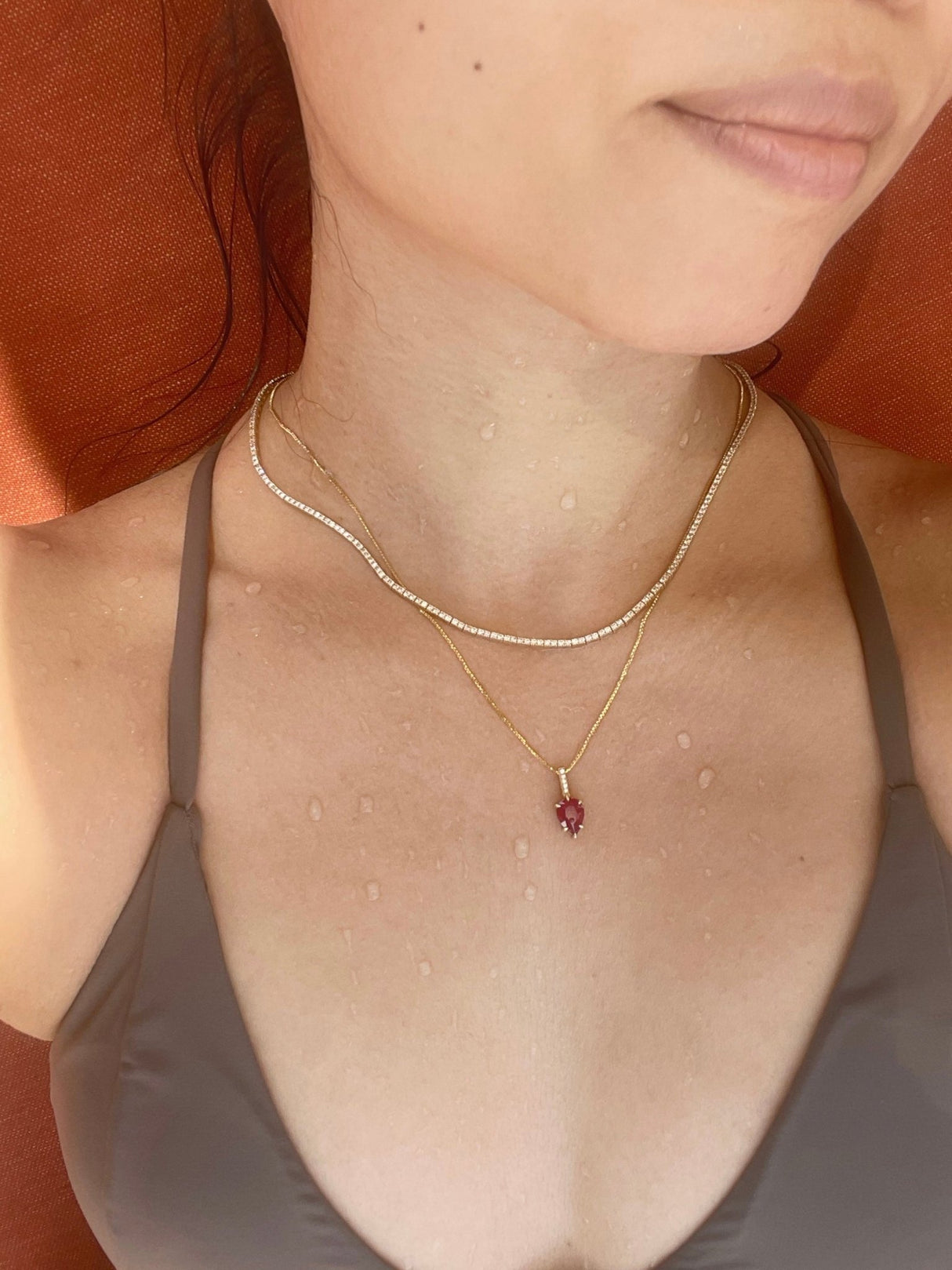 Ruby & Diamond Arrow Necklace 18k gold handmade fine jewelry on model