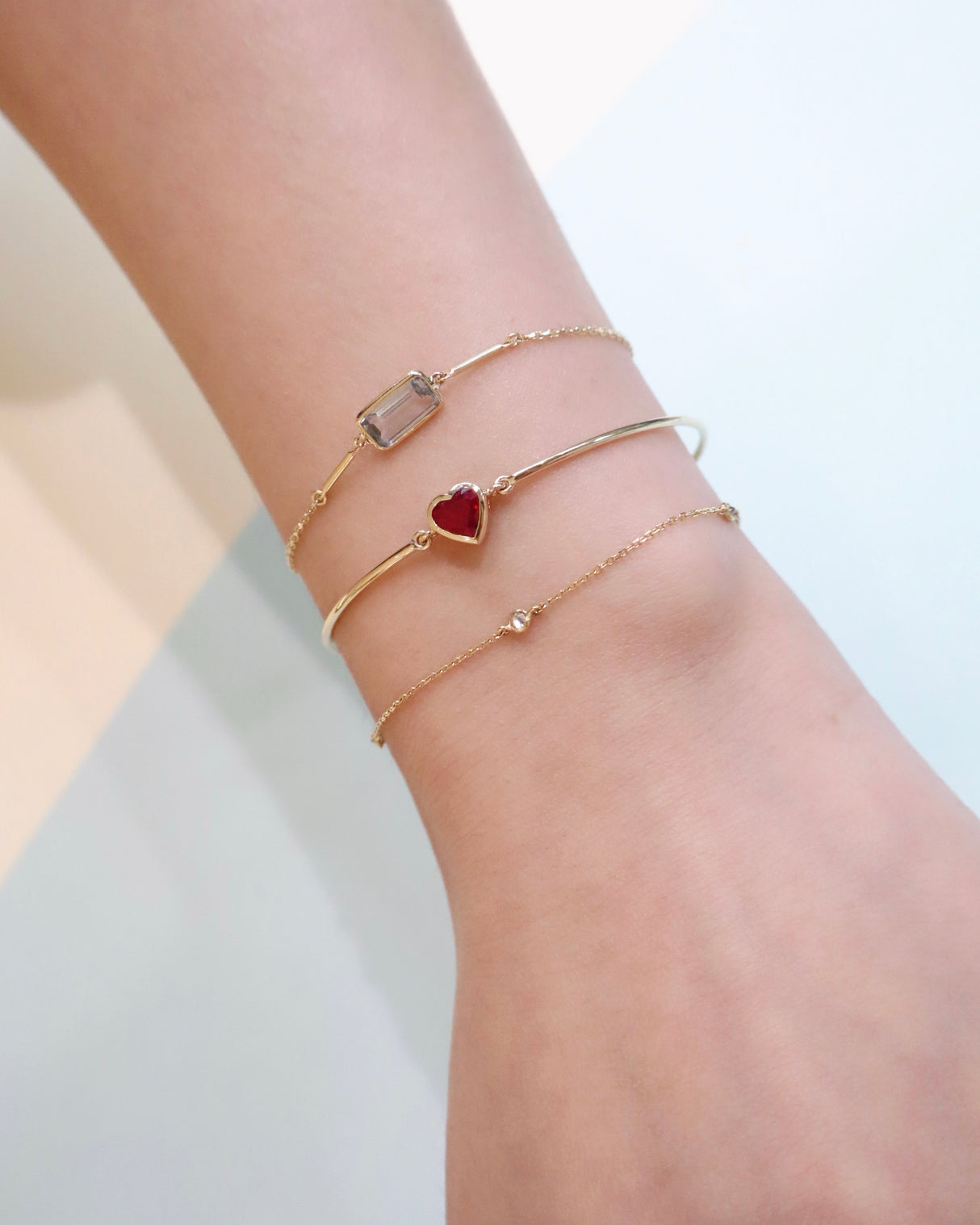 Ruby Heart Supreme Bangle 18k gold Stackable design on model 1