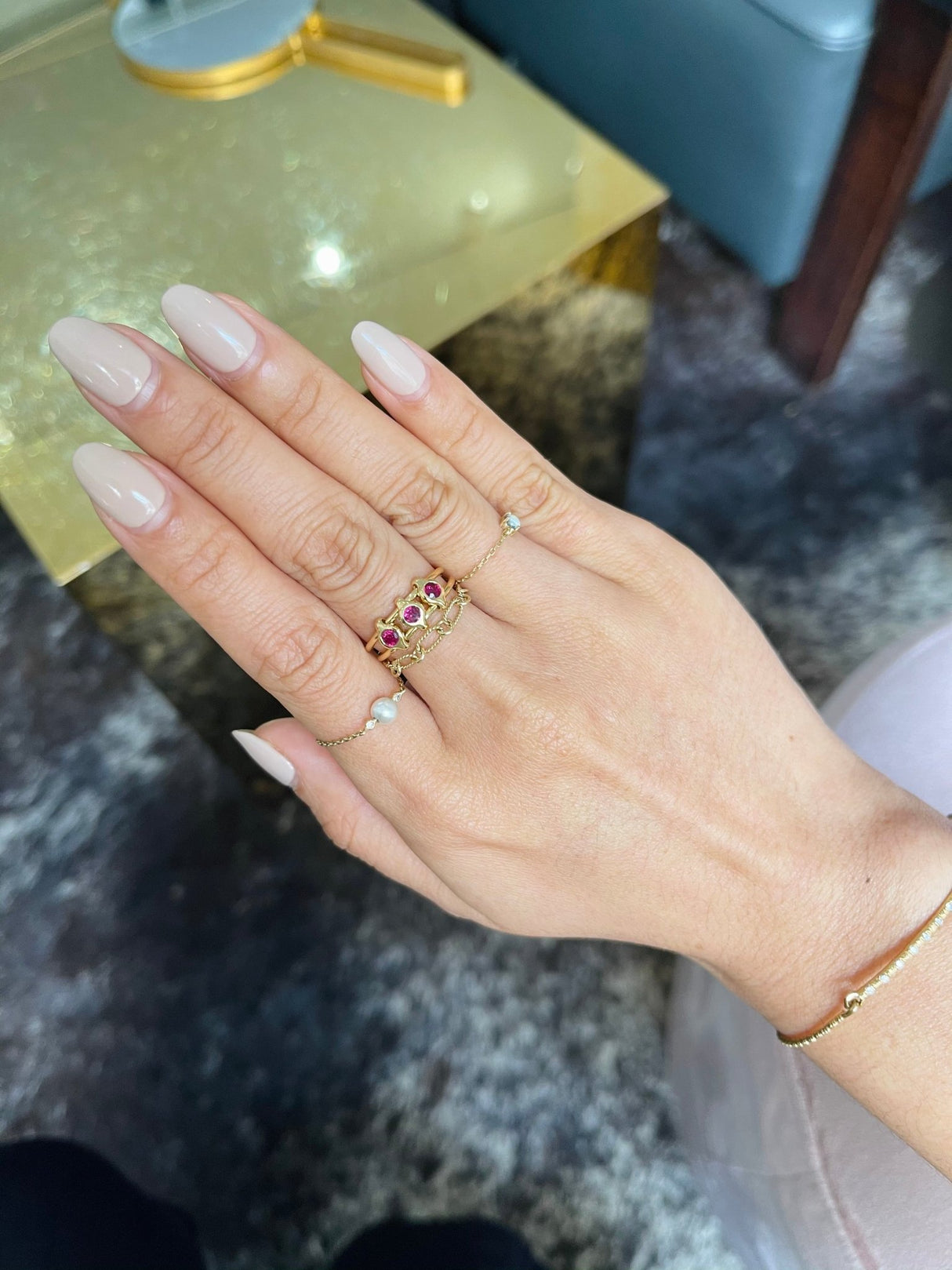 Ruby Orbit Ring 18k gold Stackable ring on model