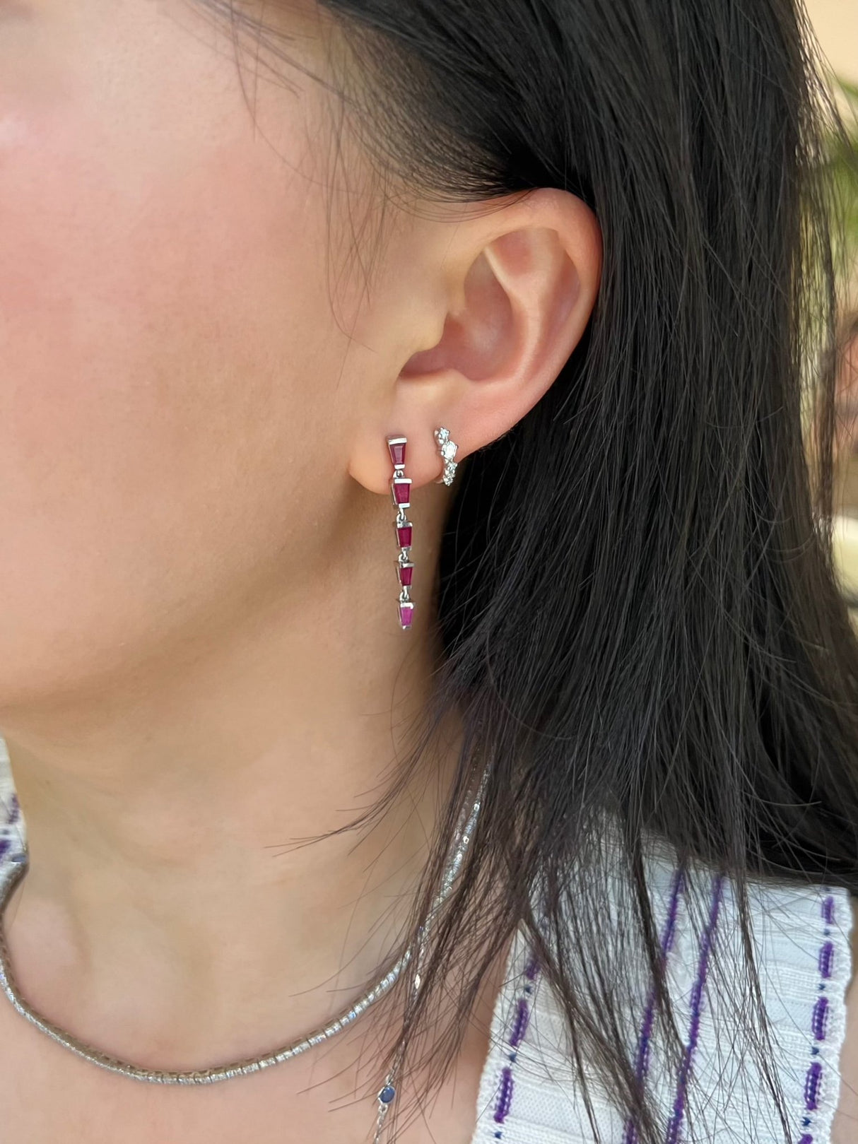 Ruby Streaming Platinum Earrings on model