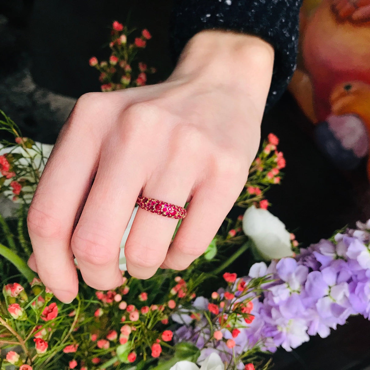 Ruby pomegranate ring 18K gold wedding band on model