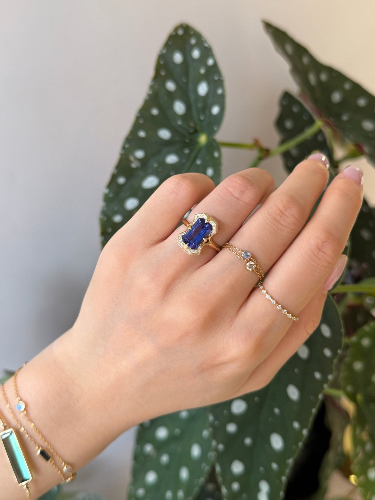 Tanzanite Aurora Ring 18K engagement ring on model 1