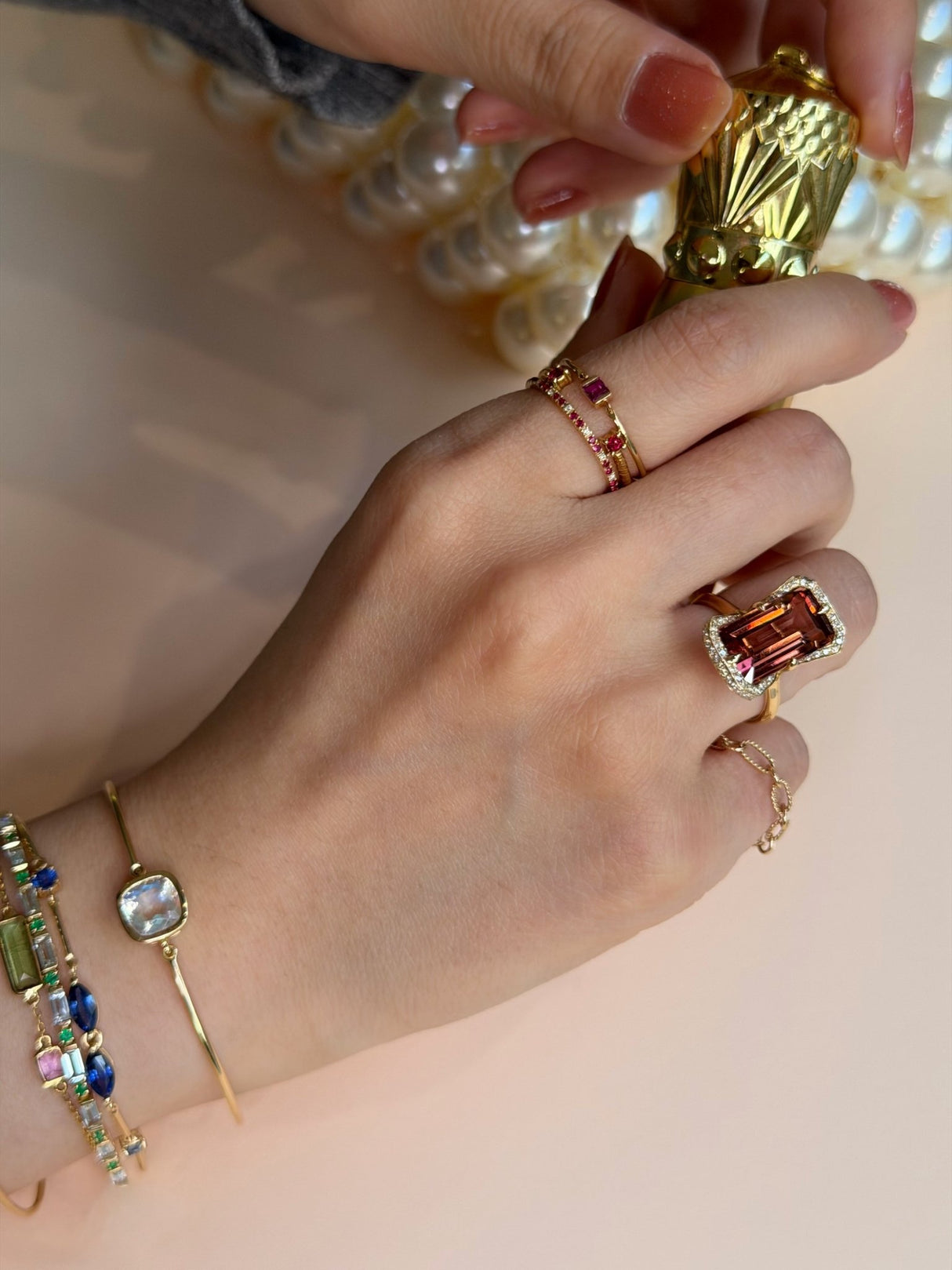 Tourmaline Aurora Ring 18k gold stackable ring on model