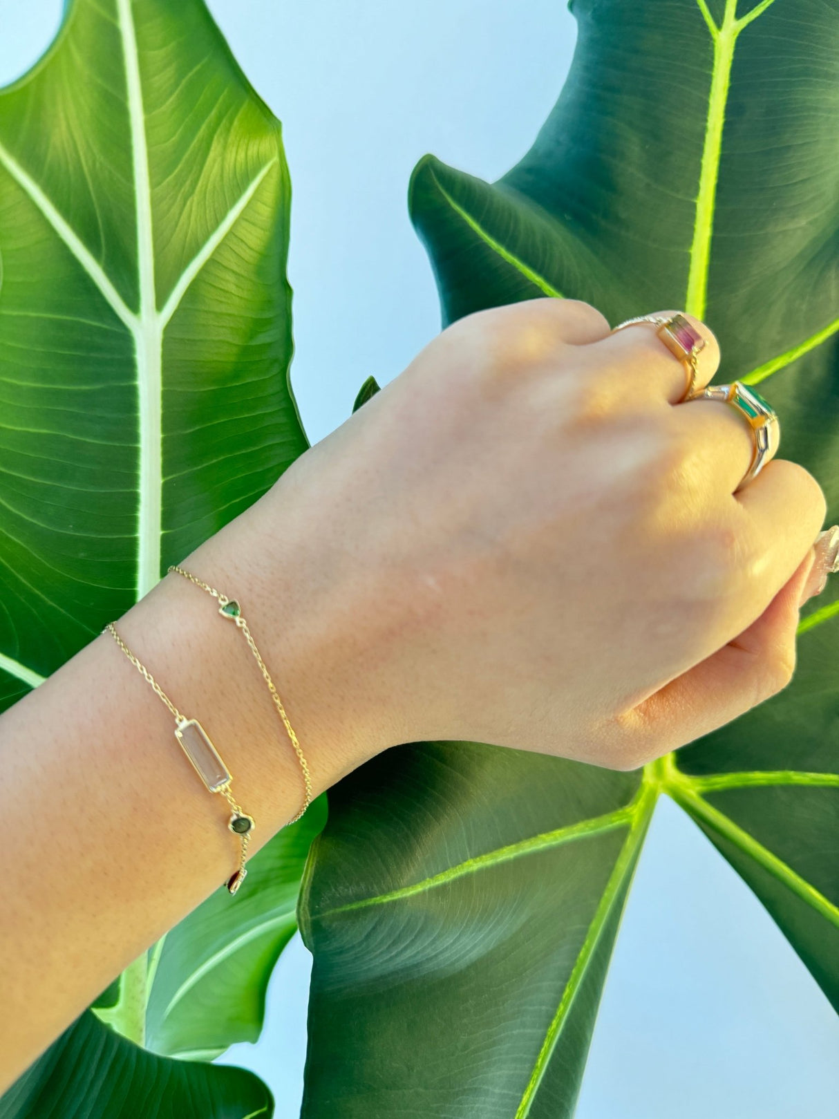 Tsavorite Trillion Bracelet 18k gold stackable design on model