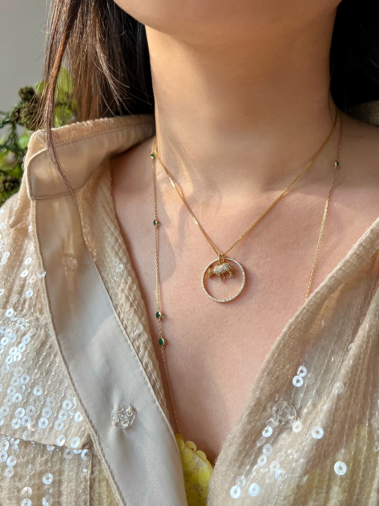 Zodiac Ox Pendant Necklace on model 1