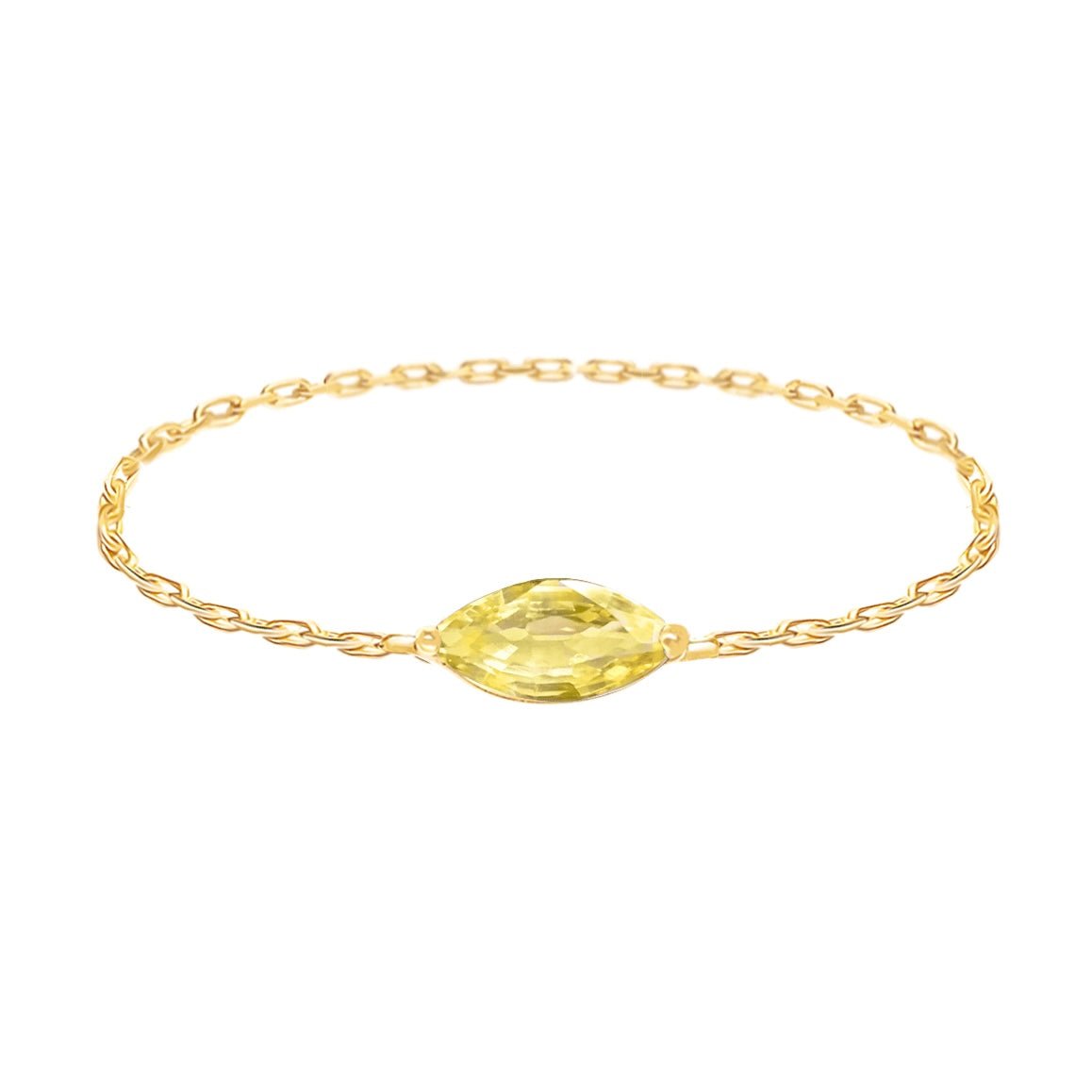 Gold chain ring with a yellow sapphire on a white background Yi Collection