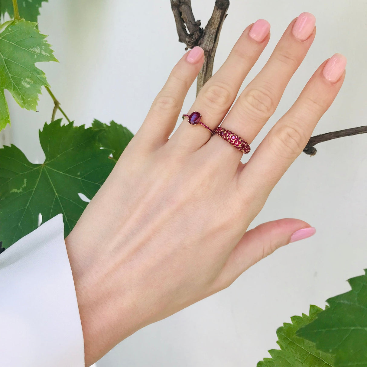 Ruby rings on a model.