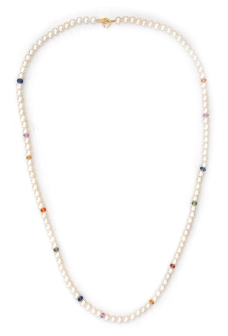 A choker necklace featuring a strand of akoya pearls with rainbow colored sapphires interspersed between the pearls, strung together with gold clasp and loop.