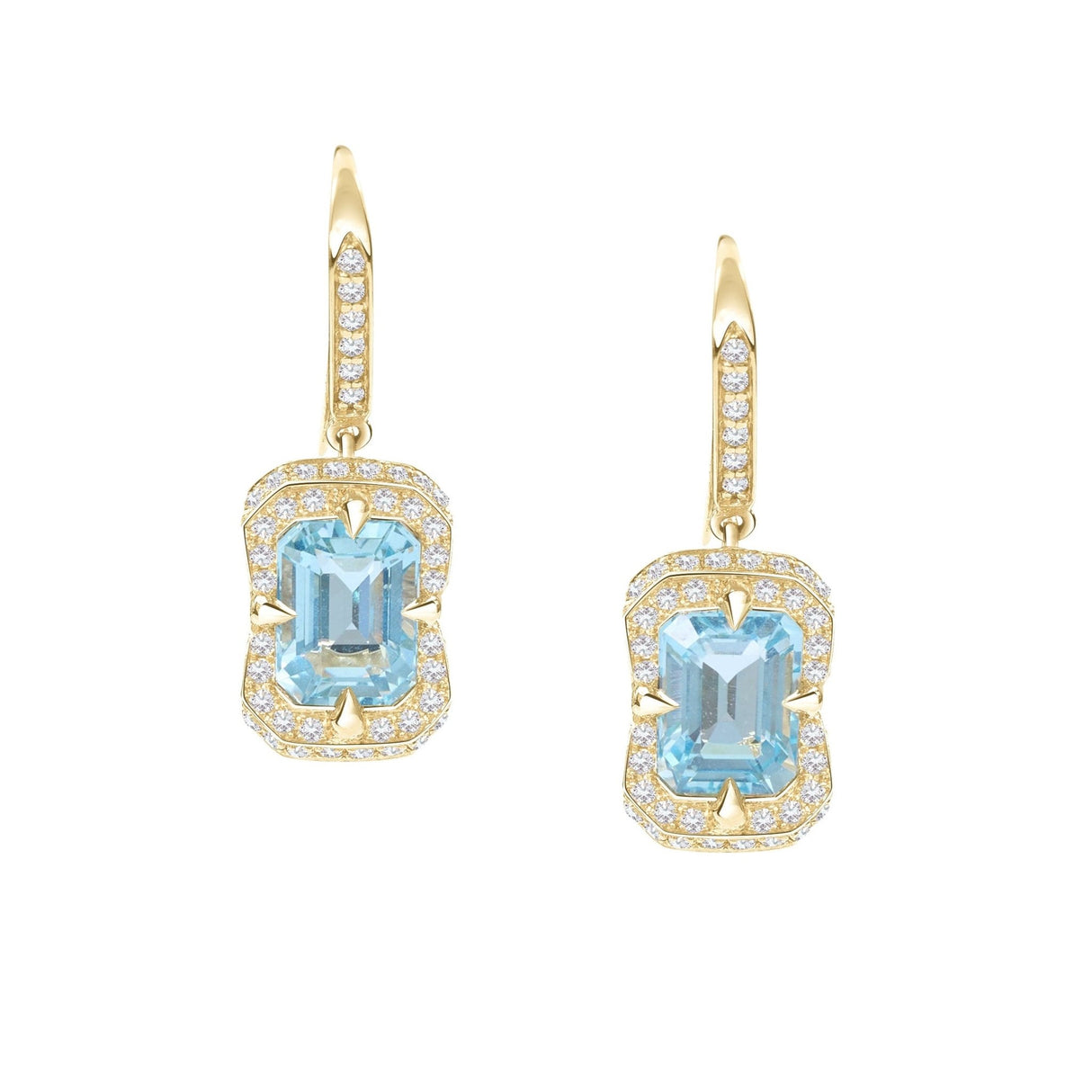Gold earrings with aquamarine gemstones on a white background