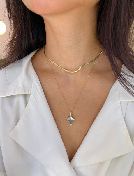 Aquamarine & Diamond Contour Kite handmade Necklace in 18k gold on model