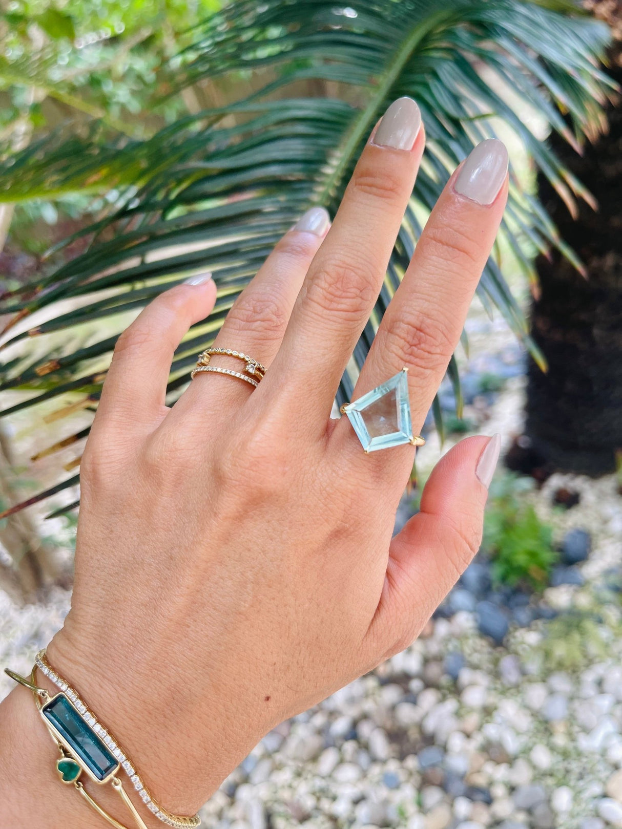 Aquamarine & Diamond Contour Kite Ring 18k gold engagement ring on model