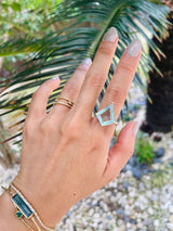 Aquamarine & Diamond Contour Kite Ring 18k gold engagement ring on model