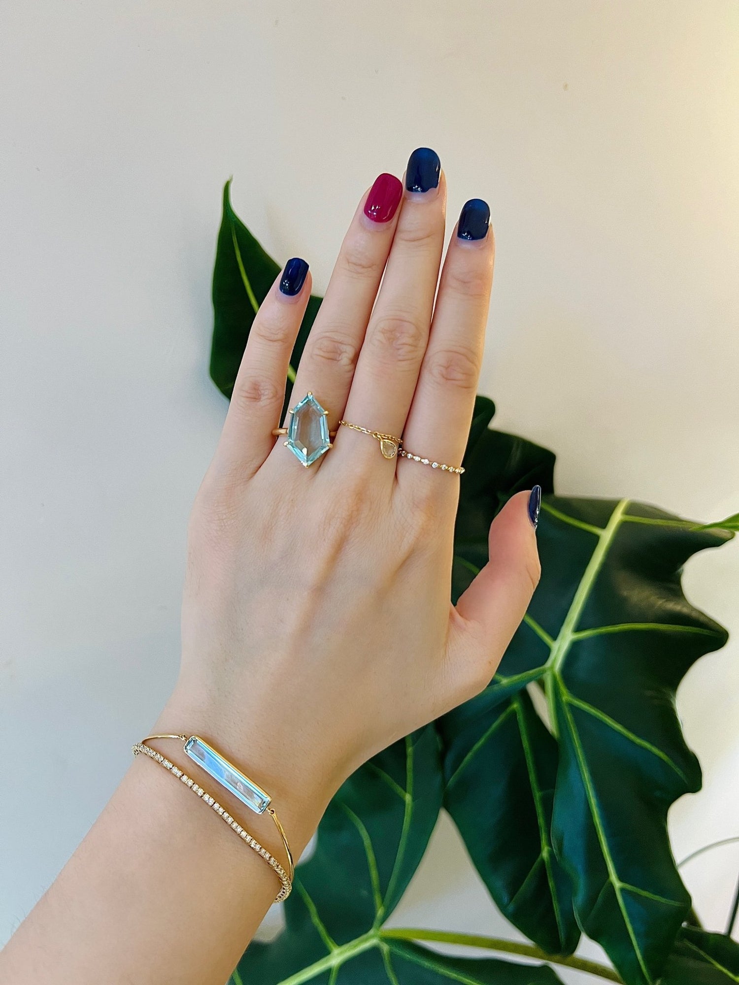 Aquamarine & Diamond Contour Polygon Ring 18k gold engagement ring on model