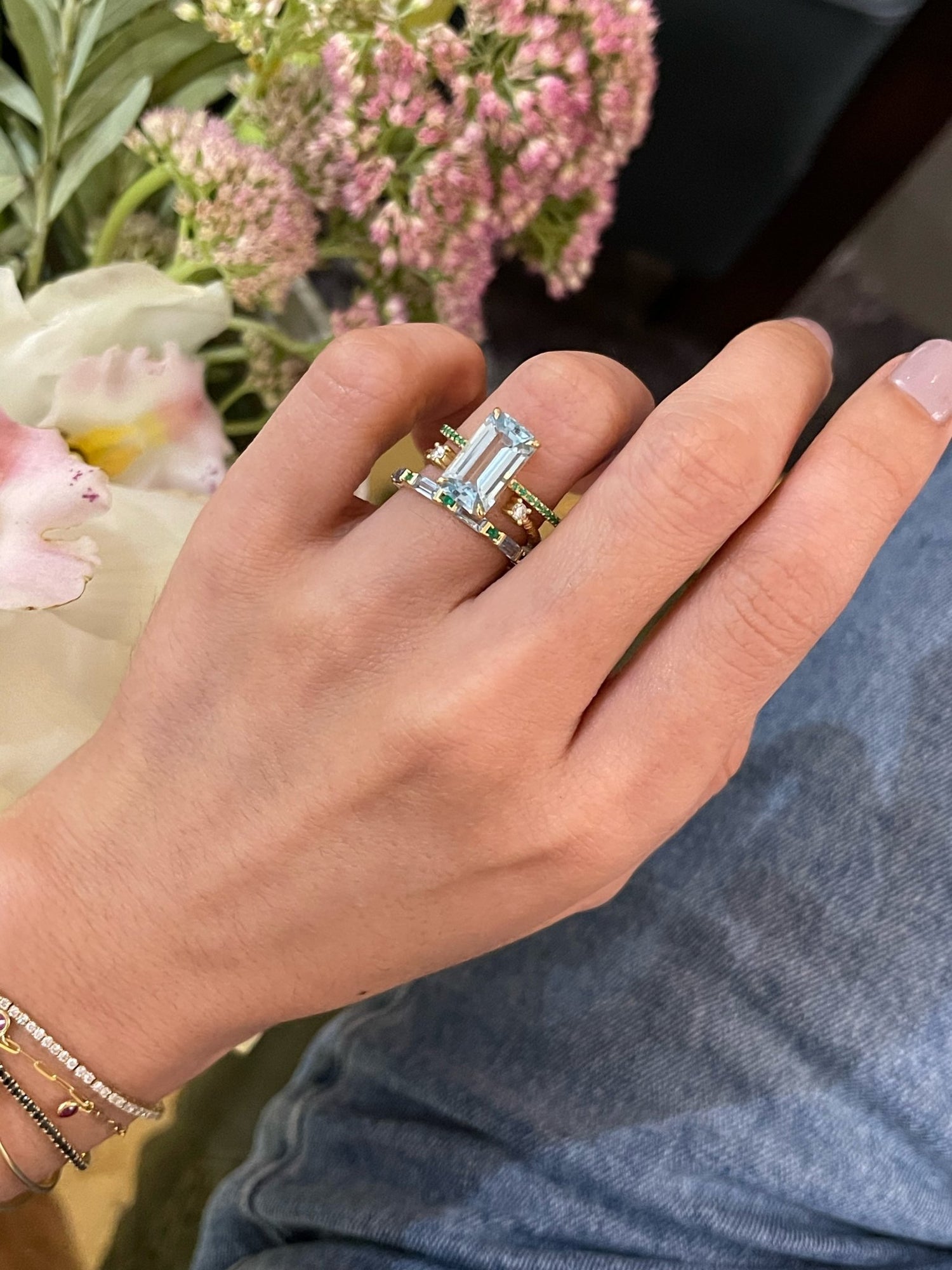 Aquamarine & Emerald Spring Infinity Ring 18k gold stackable ring on model