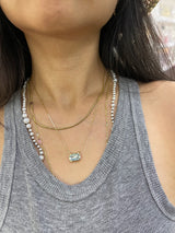 Aquamarine Nouveau fine jewelry Necklace in 18k gold on model