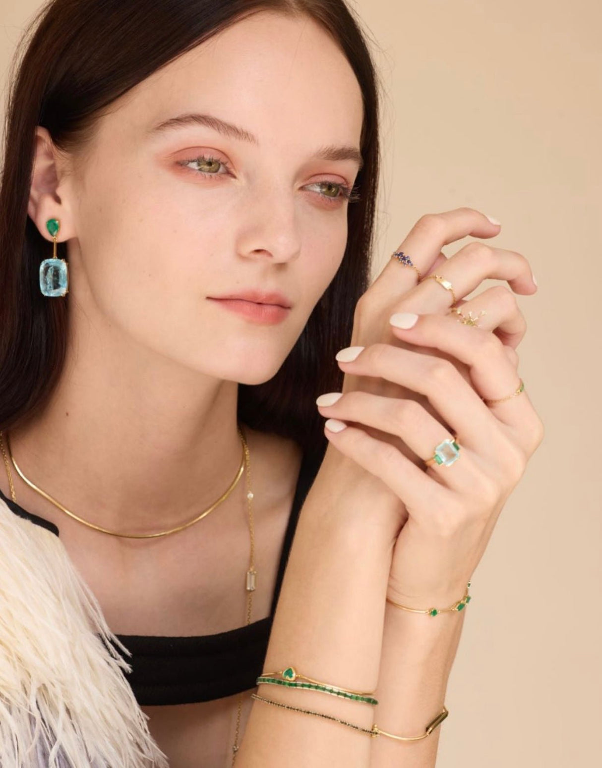 Emerald & Aquamarine Spring’s Dewdrop Earrings. Exquisite handcrafted 18k earrings by female artisans in our Bangkok studio. Vivid green emerald paired with aquamarines from Madagascar and emeralds from Gemfields. Sustainably sourced and adds just the right pop of color. 