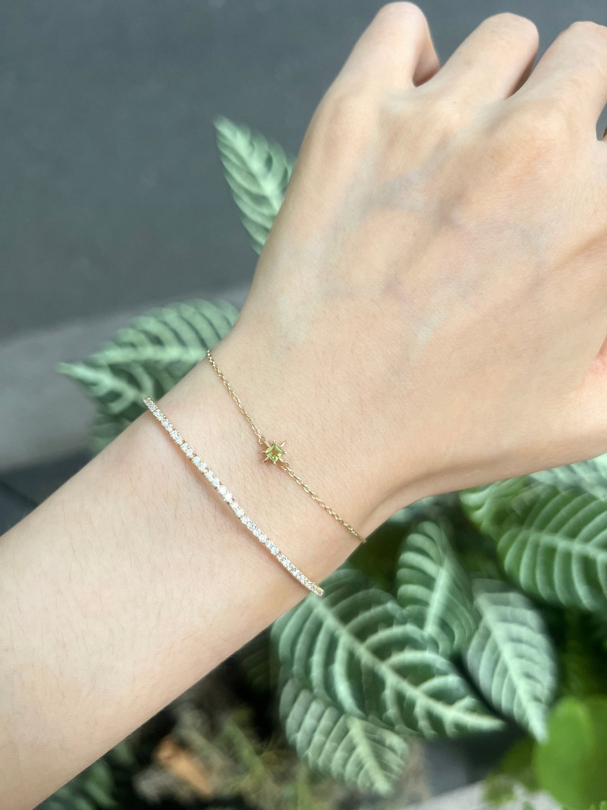 August Birthstone Peridot Bracelet 14k gold stackable design on model