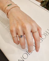 Baby_Blue_Pink_Sapphire_Ring_18K_gold_engagement_ring_on_model_3