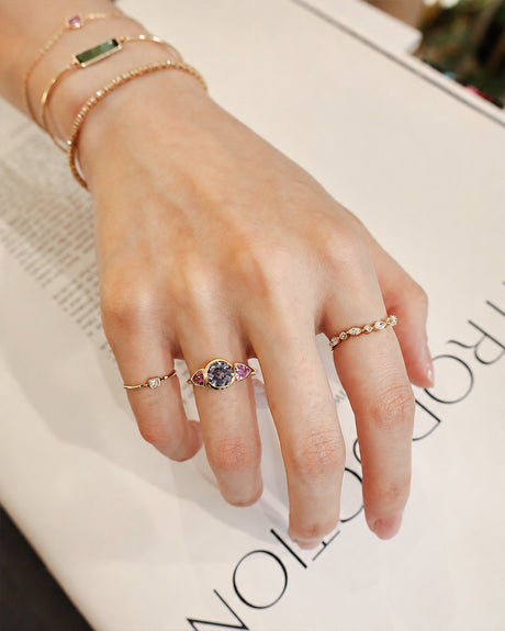 Baby_Blue_Pink_Sapphire_Ring_18K_gold_engagement_ring_on_model_3