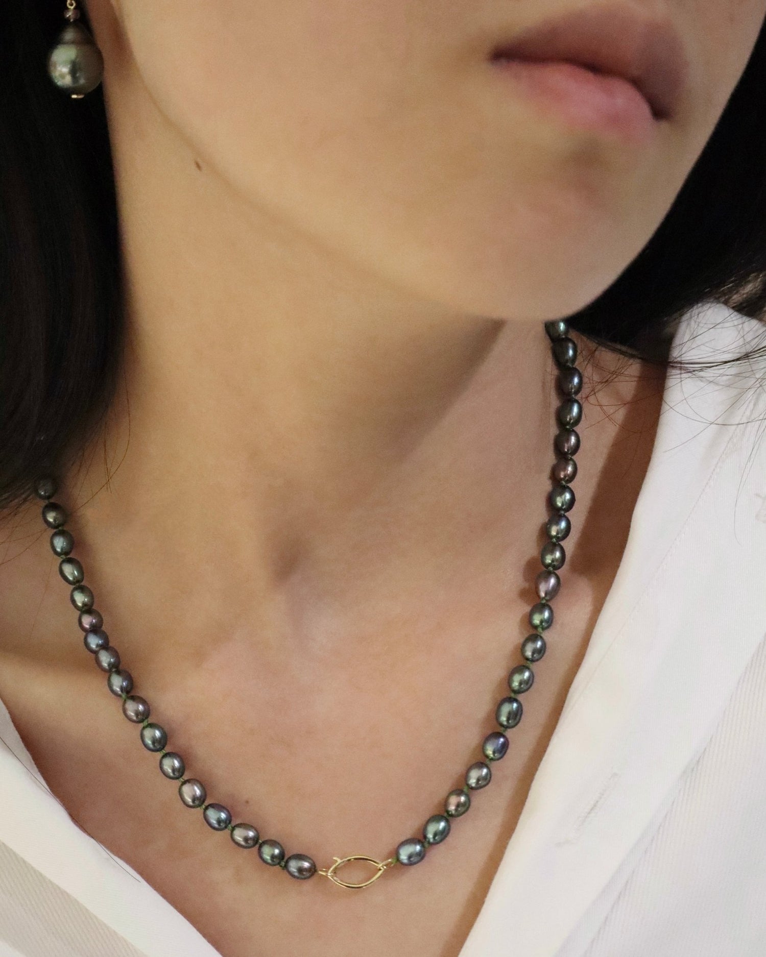 Black Pearl With Fisheye Closure Necklace handmade fine jewelry on model 3