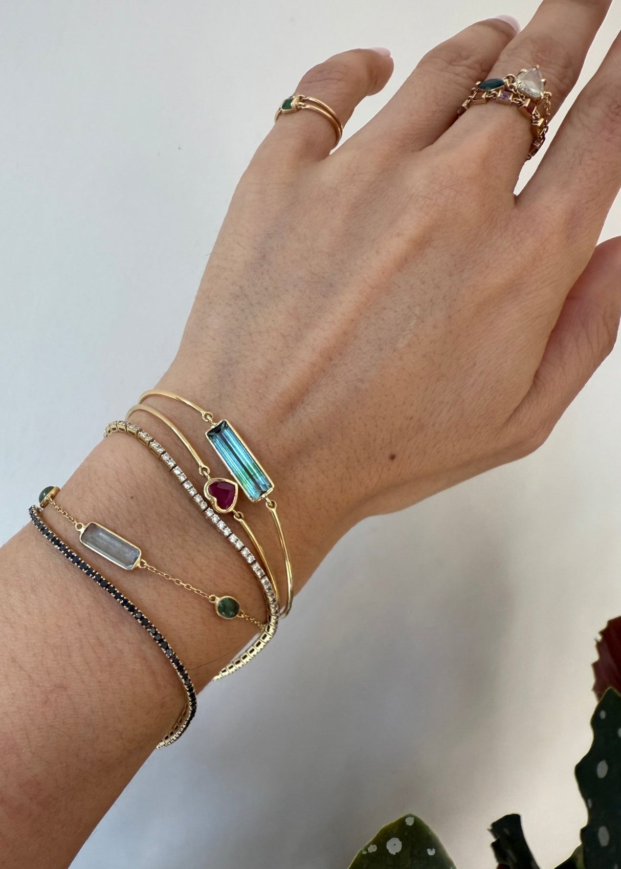 Blue-Green Lagoon Tourmaline Bar Bangle 18k gold stackable design on model