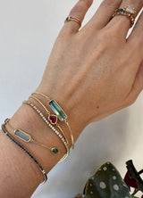 Blue-Green Lagoon Tourmaline Bar Bangle 18k gold stackable design on model 2